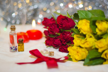 Obraz na płótnie Canvas yellow and red roses with bokeh
