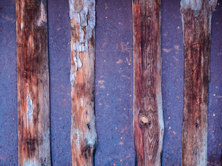 old wooden and metall surface with peeling paint