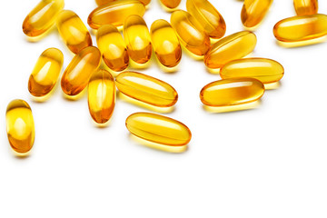 Fish oil capsules on white background. Close up, copy space, high resolution product. Health care concept