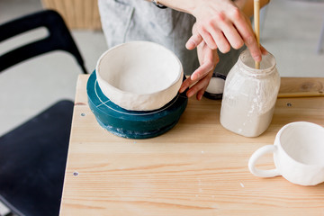 workshop production of ceramic tableware product painting