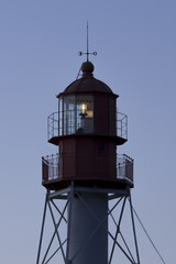 The Pape lighthouse in Latvia at sunset
