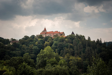 Fototapeta na wymiar Pernstein Castle, gothic and renaissance castle in Czech Republic before the thunderstorm
