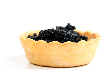 Caviar in tartlet isolated on white background
