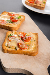 Grilled toast with camembert and cherry tomatoes