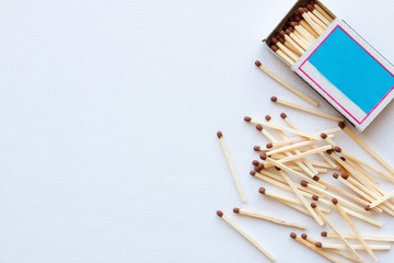 matchbox and the match on a white background with space for text