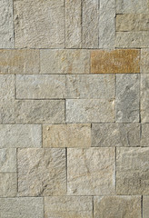 New stone wall closeup  in sun