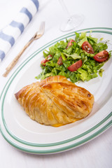 Chicken breast in french pastry with fresh salad