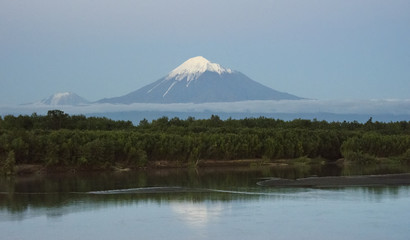 Sunset snowcapped volcano at Kamchatka