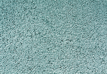 Cyan color cement wall pattern.
