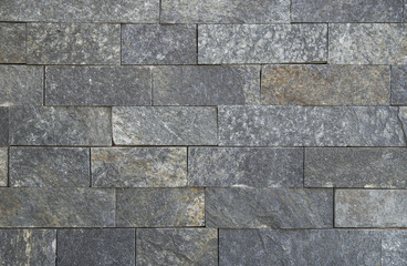 New stone wall closeup  in sun