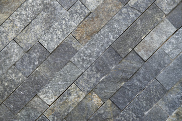 New stone wall closeup  in sun