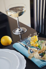 Table place setting with holidays decoration.