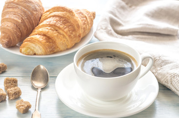 Croissants with cup of coffee
