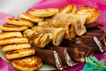 delicious pancakes in a stack with melting butter and maple syrup