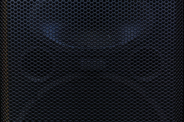 metallic mesh part of microphone and loudspeaker. background,texture,dot 
 photo intended : vintage...