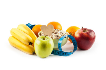 Muesli in bowl and fresh fruits