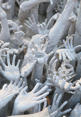 CHIANG RAI, THAILAND -  February 27, 2010: beautiful and amazing Wat Rongkhun (White temple).  Part of the sculpture.  White temple, Chiang Rai, Thailand.