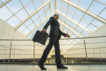 Fototapeta premium The man walk in the office balcony