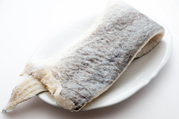 Slice of raw salted codfish