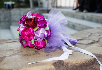 beautiful wedding bouquet, which lies on the parapet