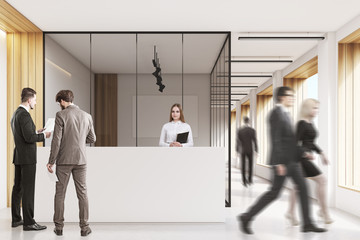 Fototapeta premium People in office lobby, clean and bright