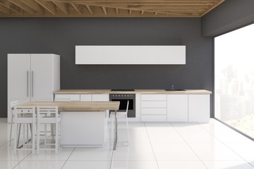 Kitchen with stools and narrow picture