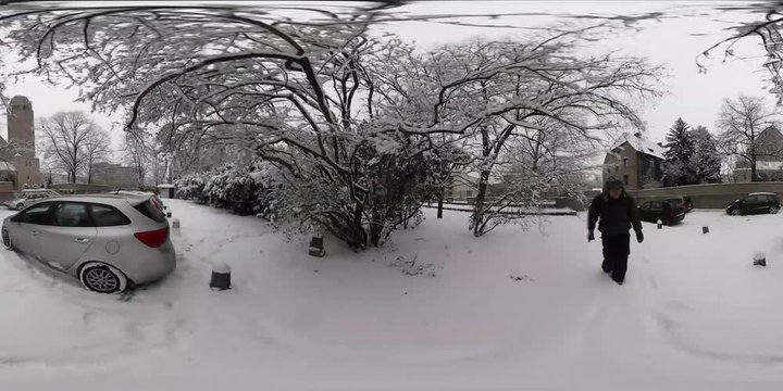 360Vr Video Man Walks Around Church Winter Cityscape Snowy Park and Parking Trees Covere With Snow Catholic Cathedral and Its Tower Opole Sights Tourism