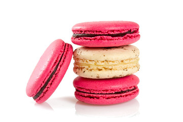 raspberry and vanilla macaroons isolated on white