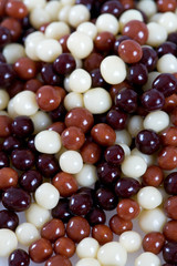 chocolate candies (crunches) isolated on white