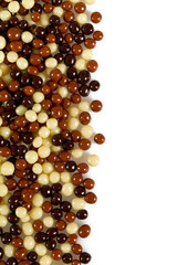 chocolate candies (crunches) isolated on white