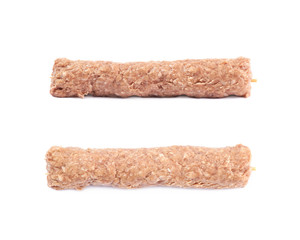 Raw kebab meat on a stick