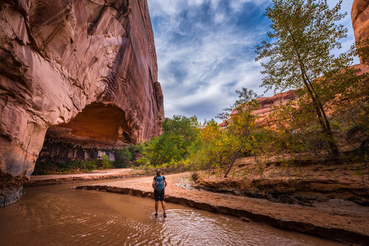 Backpacker Girl Exploring Coyote Gulch Grand Staircase Escalante National Monument