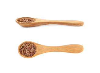 Wooden spoon of brown rice