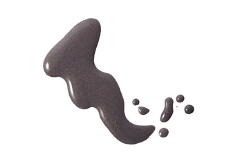 Grey color nail polish with yellow glitter on background