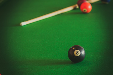 Snooker ball and stick on billiard table