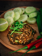 Vintage style Thai traditional food Nam Prik Num (Northern Thai Green Chilli Dip) on top and wooden background wallpaper