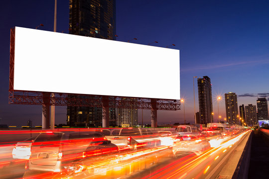 White Blank billboard with traffic jam in the night