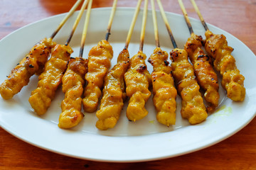 Traditional Thai steak roasted pork, moo satay, Thai food served on plate