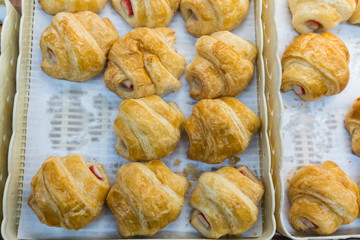 Bread in basket staple food with a group of baked goods from a bakery dough or home cooking in store or supermarket