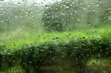 Water drop on glass in a rainy season