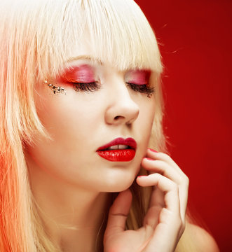blond woman with bright make-up