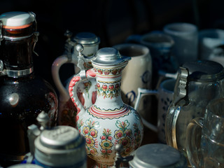 Antique pitcher made of glass and silver