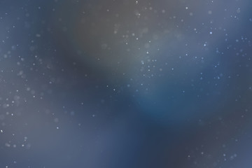 Abstract Dust Particles on Colorful Background with Narrow Depth of Field