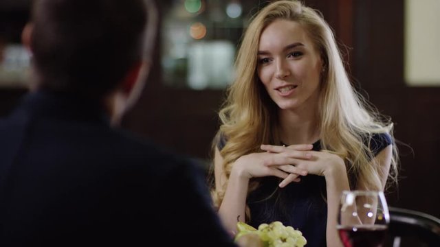smiling cute lady getting a present to valentines day