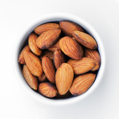Peeled almonds isolate is on white background