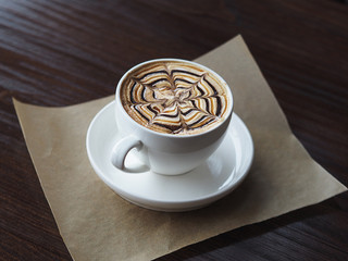 cup of coffee with drawing