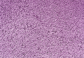 Purple color cement wall pattern.