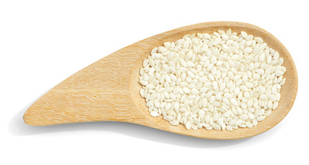 organic white sesame put in wooden spoon isolated