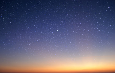 Fototapeta premium starry in the night sky with sunrise
