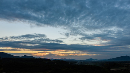 sunset over the mountain hills